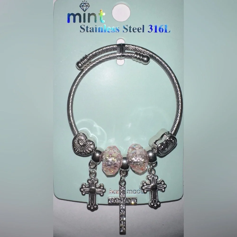 Mint Stainlees Steal Charm Bracelet with Divinity Cross, Hearts and Beads.